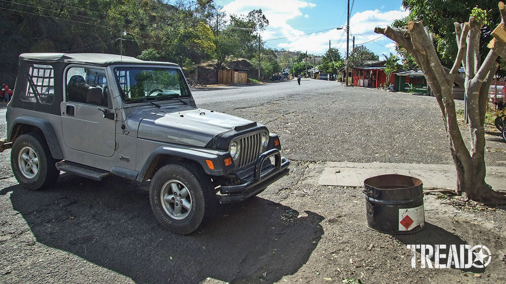 Eager to get moving, the author waits at the border to exit Honduras.