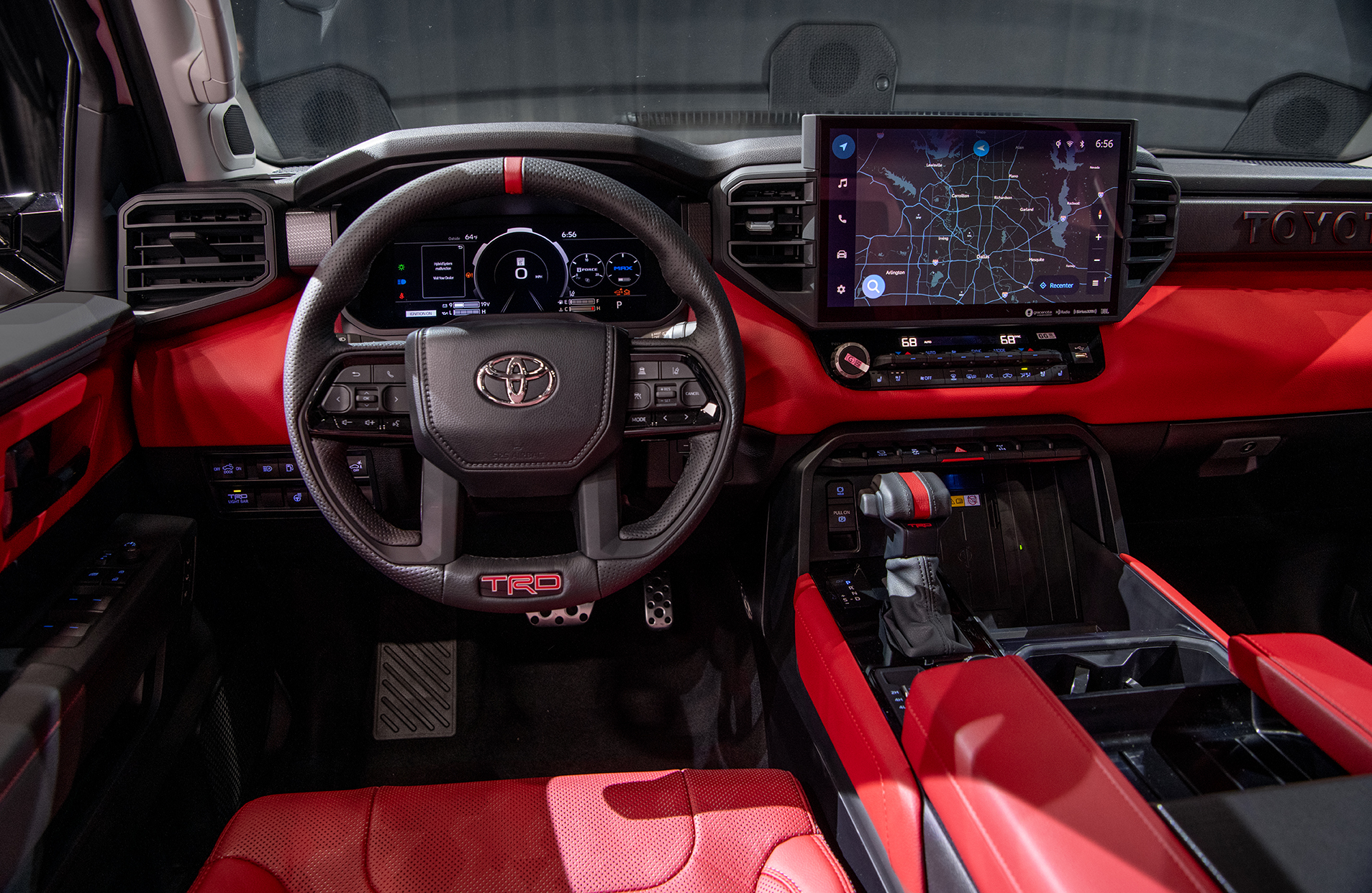 steering wheel of the all new red interior of 2022 Toyota Tundra TRD Pro in Super White