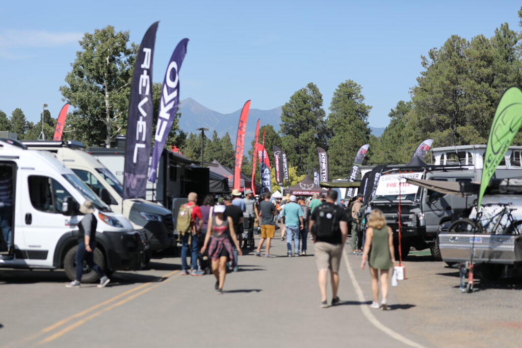 Crowd walking down aisle at Overland Expo West 2021