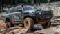 4Runner drives up rocky terrain.