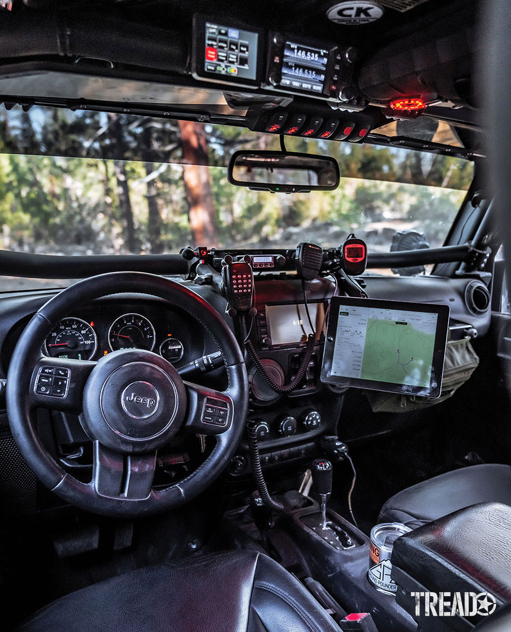 The cockpit of HQ1 shows all the comms needed and the rocker switch panel to control lights and more.