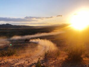 Off-road vehicle on a dirt road.