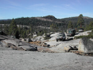 Land Rovers on an off-roading trip on the Rubicon Trail.