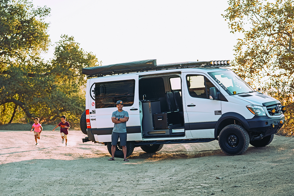 Brian and his kids by the 2018 4x4 diesel Mercedes Benz Sprinter.