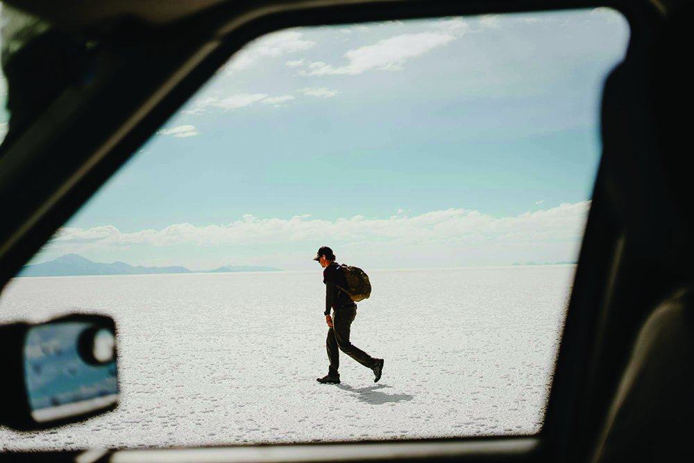 Andy Ellis walks across the salt flats: supporting military