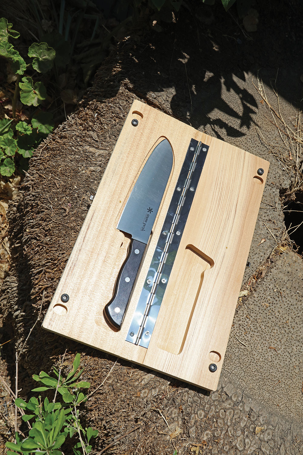 Snow Peak Cutting Board Set L knife nestles in its cutout.