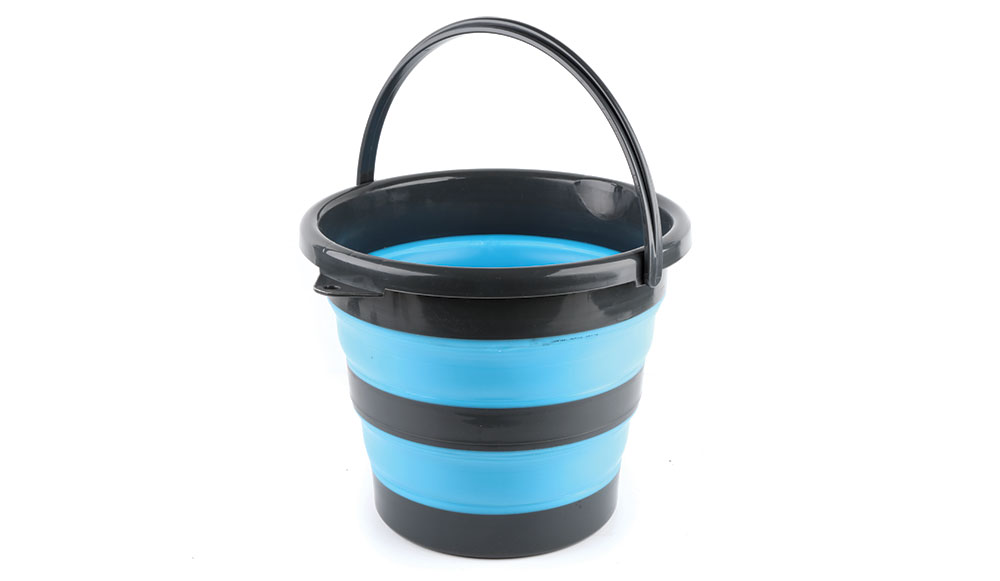 Hikers' gear always includes a bucket that packs down like this black and blue one.