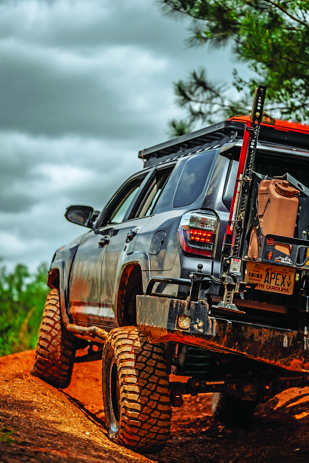 A rear bumper image of the 4Runner showing its custom license plates that read "APEX"