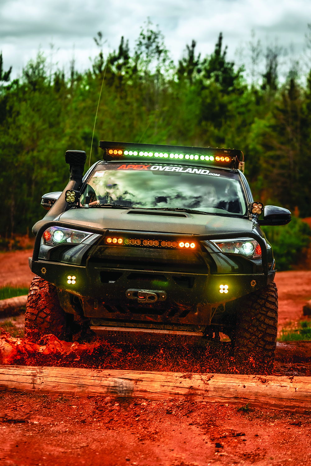 A front bumper shot of the Apex Overland 4Runner highlights its front LED light bar.