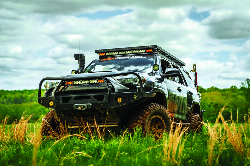 The front bumper of the black 4Runner.