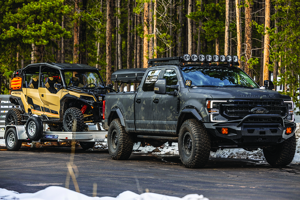 The F250 Tremor pulls Mike's yellow Polaris ATV.