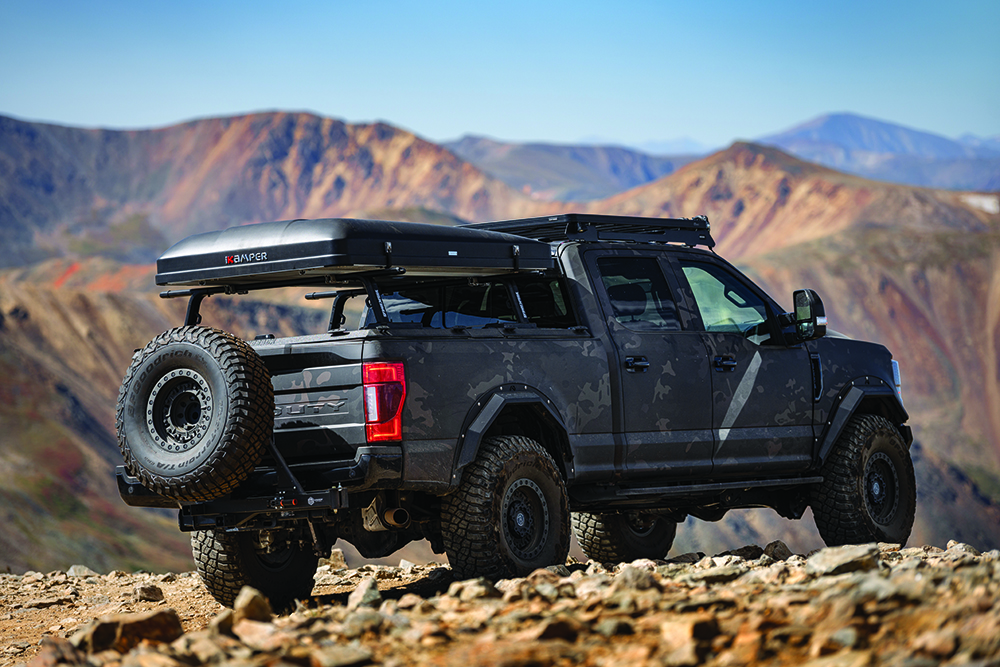 The black camo F250 Tremor rolls over rocks with ease.