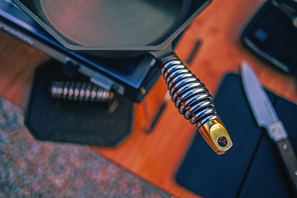 An up-close look at the stainless-wrapped handle of the pan.