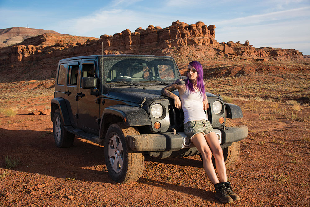 Pépin poses with her Jeep in Utah. 