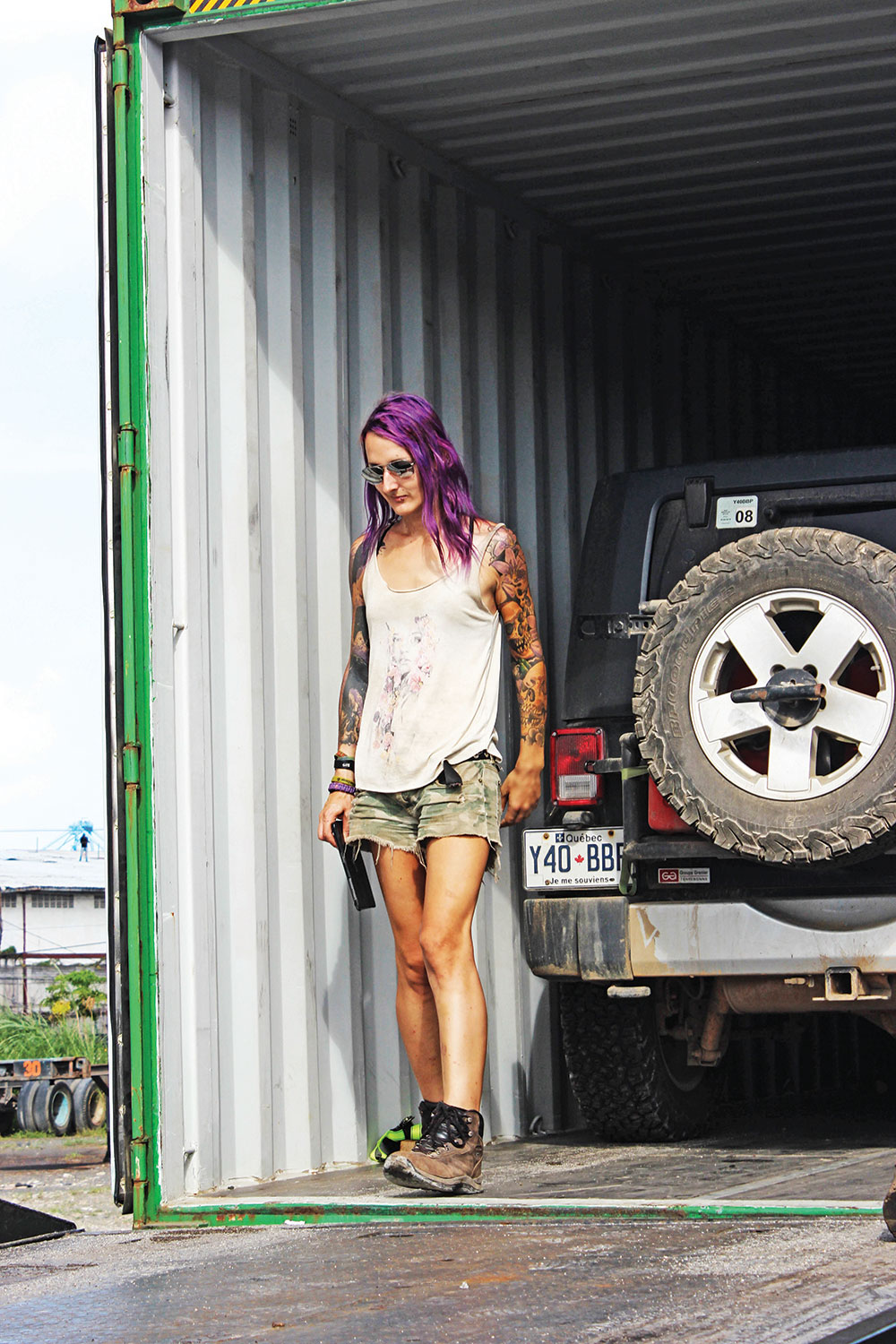 Pépin at her Jeep's storage container. 