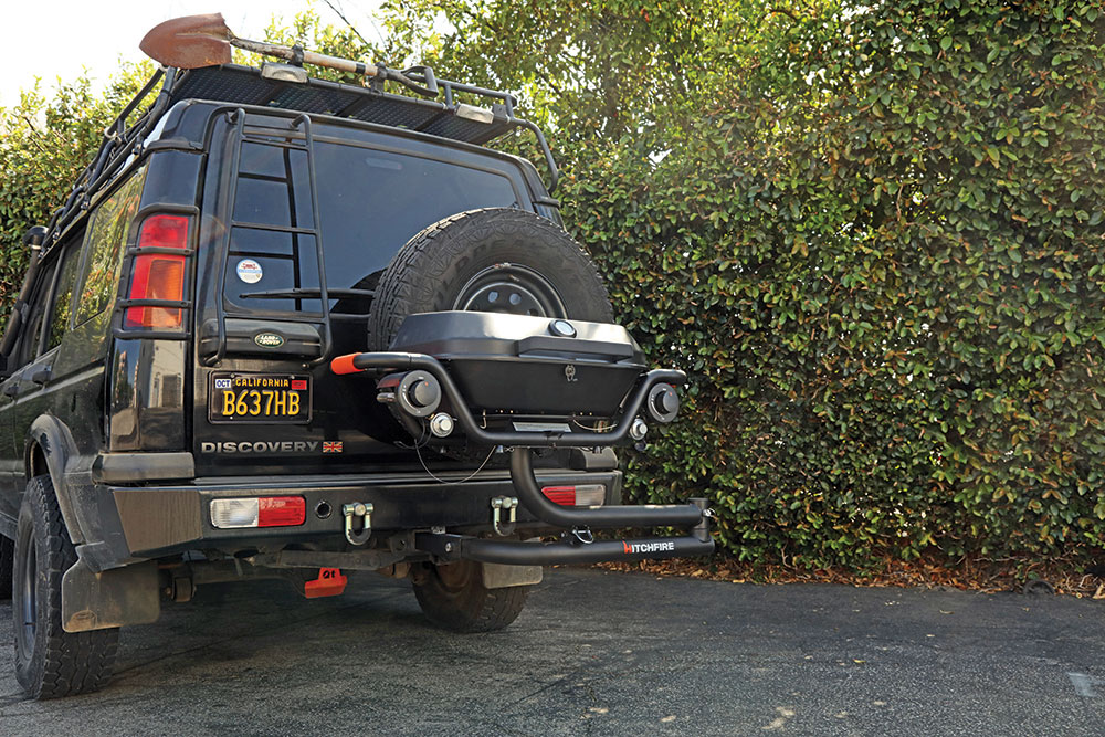 The hitch extender for the Hitchfire Grill allows for an additional 2.5 inches to clear the spare tire mounted on the rear hatch door.