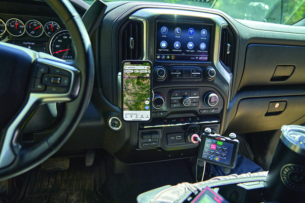 A cell phone holder uses the OnX Offroad app