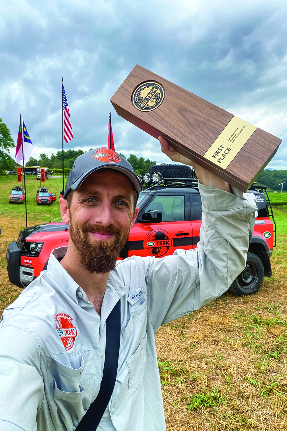 Bryon Dorr with the media wave winning trophy for his team “No Time To Cry” at Land Rover TReK 2021