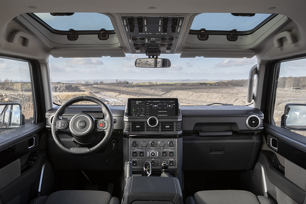 Interior shot of front dash, steering wheel and instrument panel of the INEOS Grenadier.