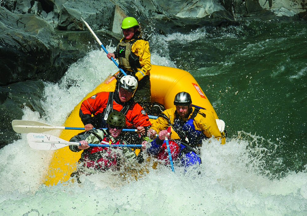 actions photography of rafting on a river