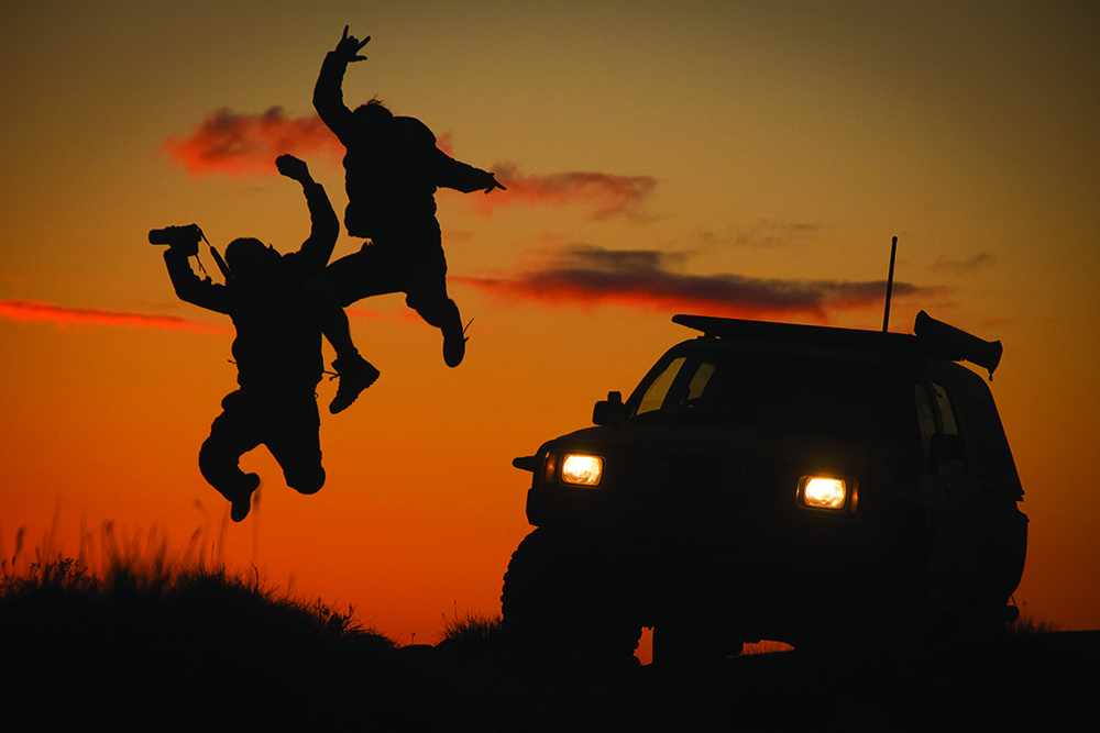 Friends Jumping in the air in australia