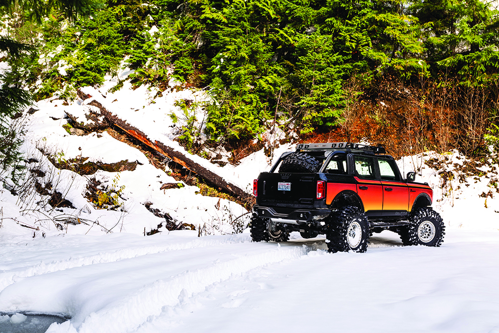 The hi-vis graphics make the Bronco stand out in the snow.