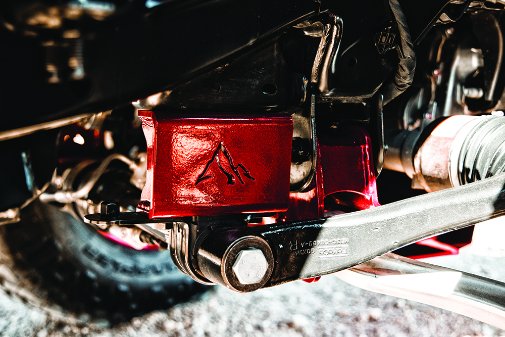 Sway bar drop-down brackets with red paint and mountain logo 