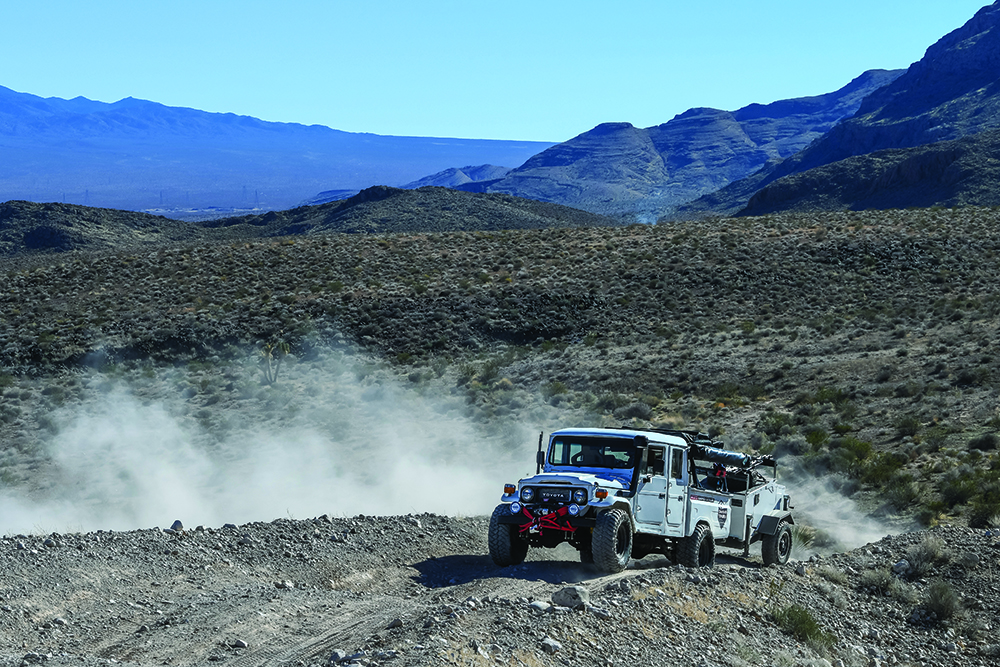 A wide shot of the Bandi kicking up a dust cloud.