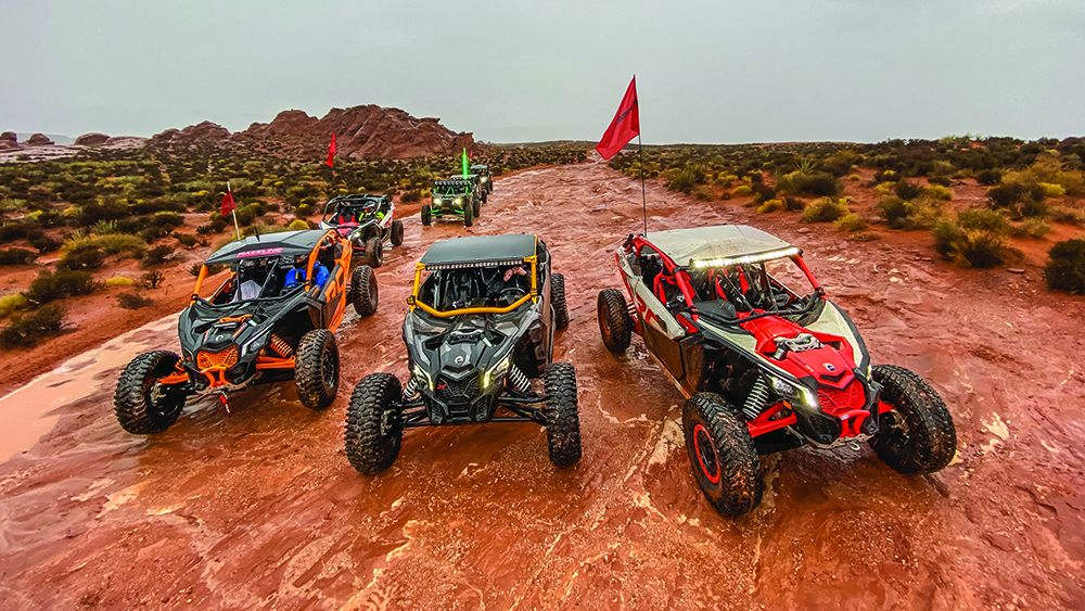 The UTVs line up at the start.