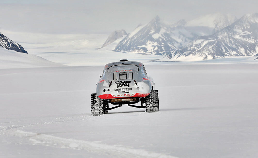 The Valkyrie Racing Porsche 356 glides over snow.