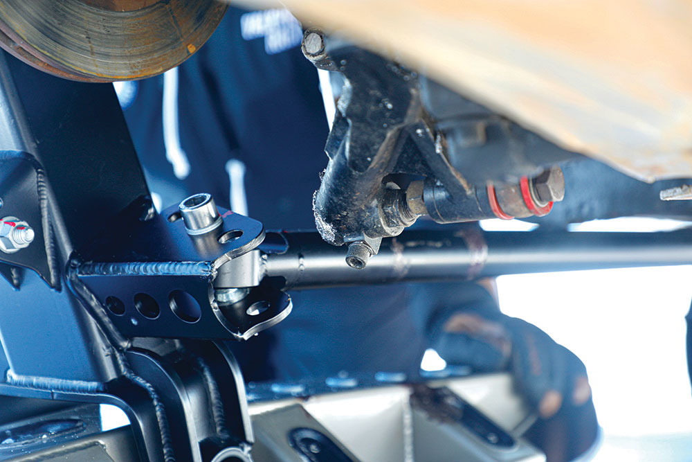 The bolt attached to the new ski hub on the underbody of the Porsche.