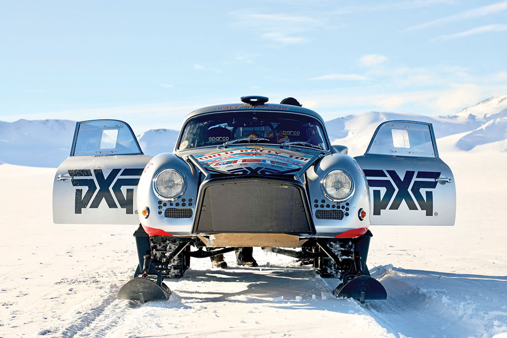 A front shot of the Porsche with doors open to showcase Rally decals.