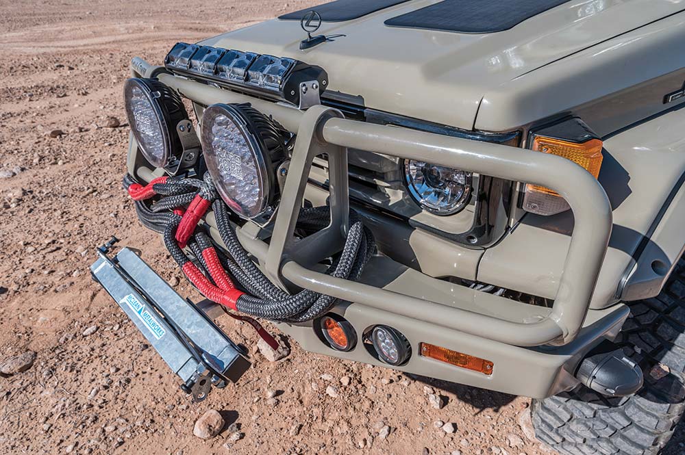 The front end of the tan Lexus Troopy.