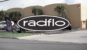 Radflo Suspension logo superimposed over an image of their shop.