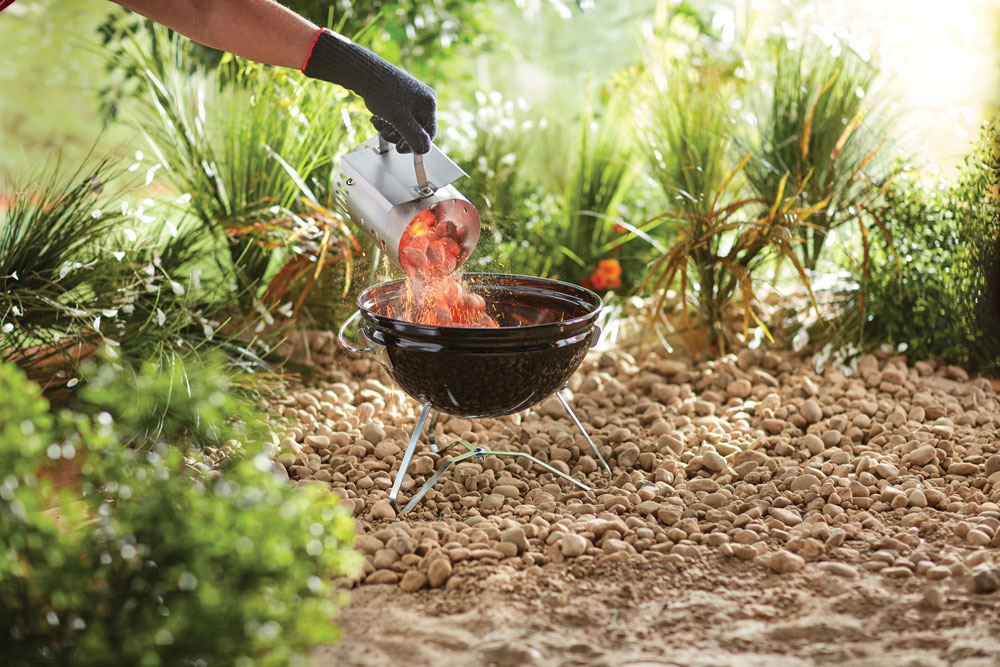 Coals and a small grill are an important part of campsite cuisine cooking.