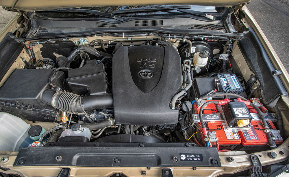 The engine bay of the Tacoma.