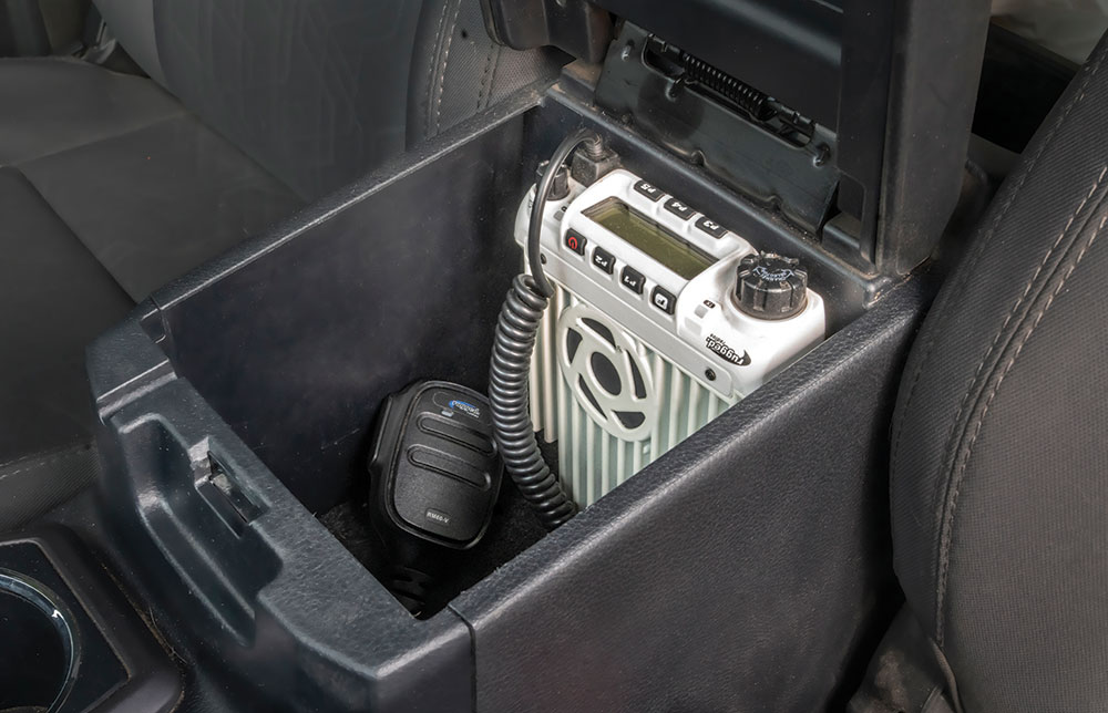 A radio is stashed in the truck's center console.