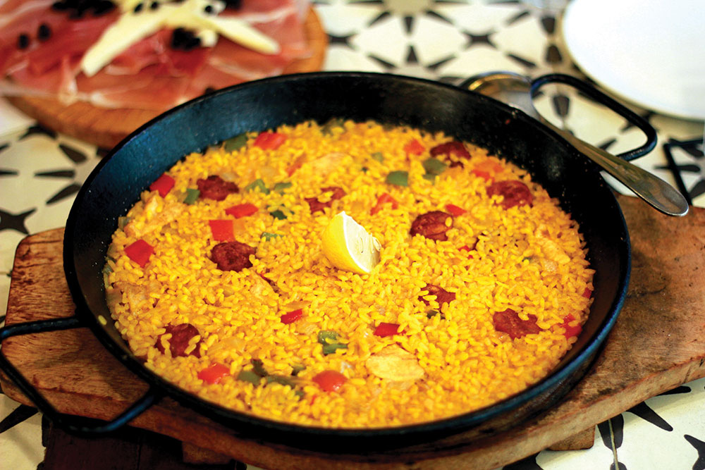 Recipe for paella in a cast-iron pan.