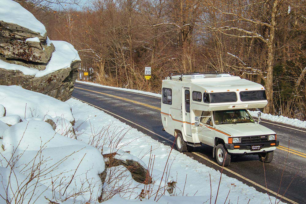 The color of the Sunrader is 033 Factory Toyota White.