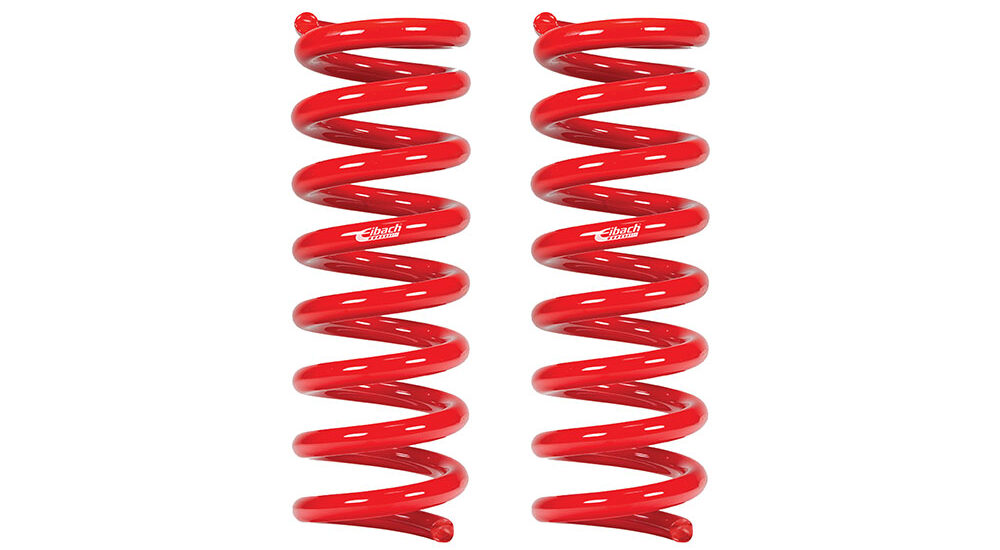 Red Toyota lift kit springs.