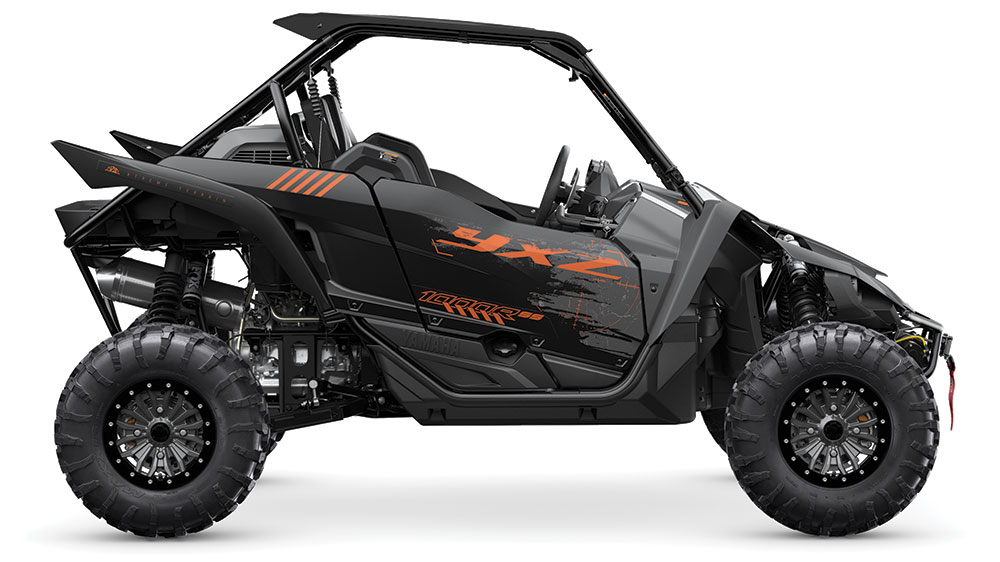 The black Yamaha UTV on a while background.