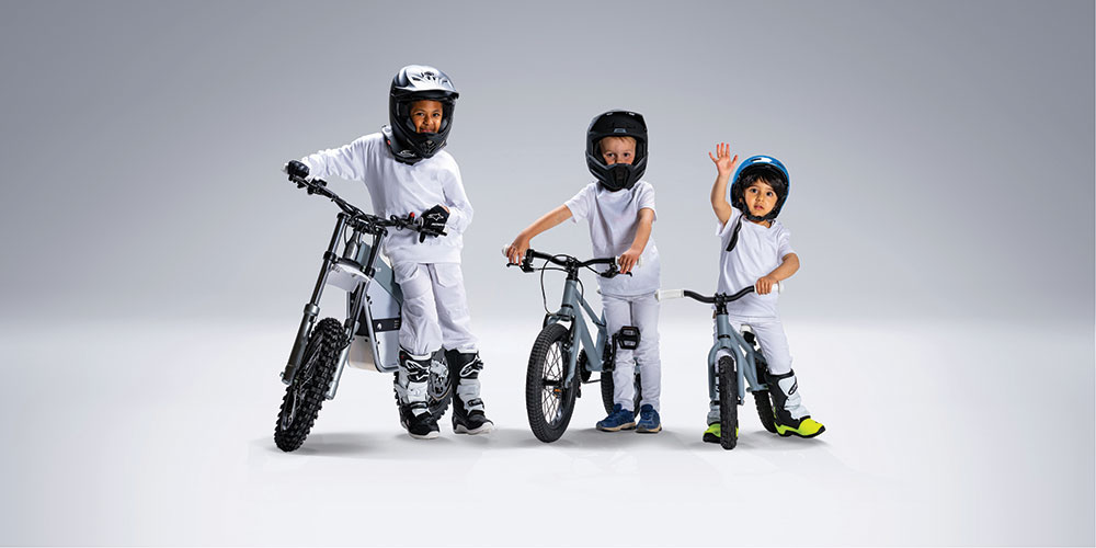 Cake / Ready, Steady, and Go Kids Bike Collection three kids on bikes with helmets 
