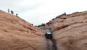 Jeep drives up Hell's Gate on Hell's Revenge in Moab, Utah.