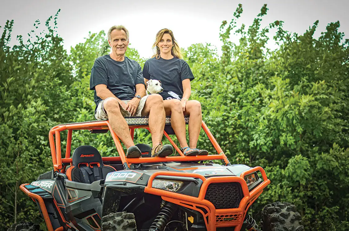 SuperATV Chairman Harold Hunt poses with his daughter Lindsay