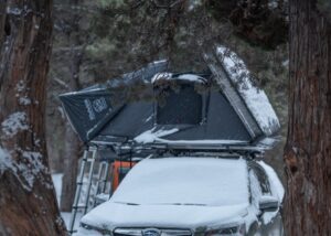 Skycamp Mini 3.0 in a snowy forest 