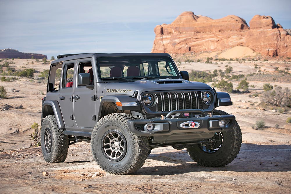 The Rubicon's large wheels are a prominent feature when parked.