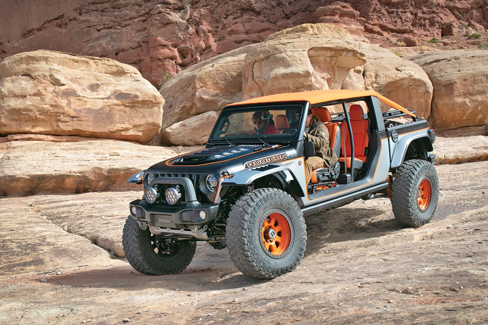 The Jeep Bob concept has orange accents, including wheels and a soft top.