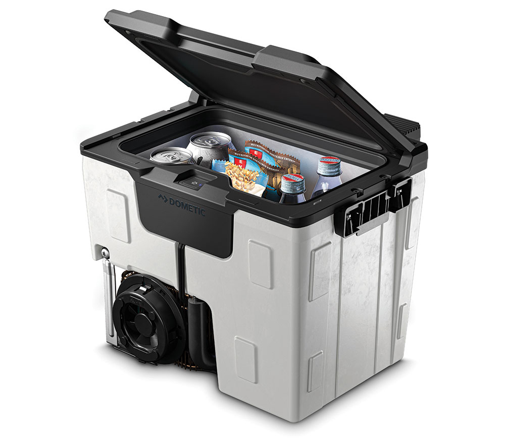 The gray Dometic fridge holds all the food and drink a bug out rig needs.
