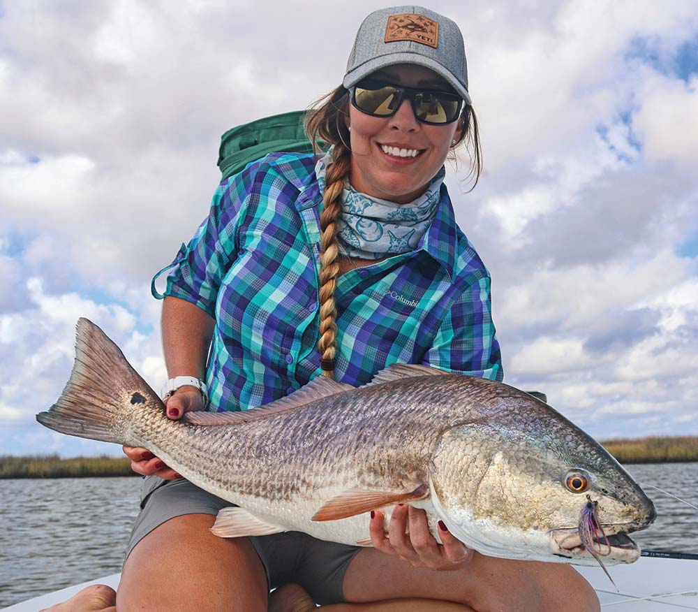 Alissa with a fish she caught