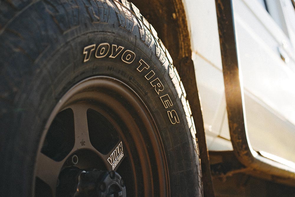 A close up of the tires shows the Toyo Tires logo.